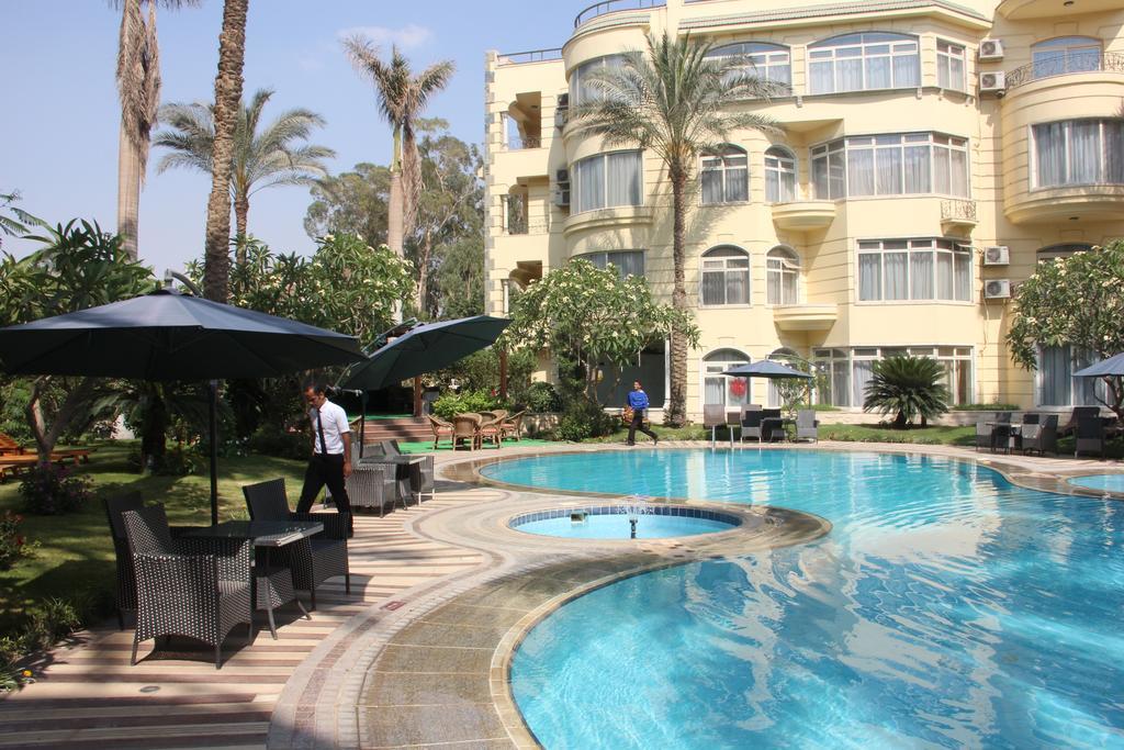 Soluxe Cairo Hotel Kafr Ghatati Bagian luar foto